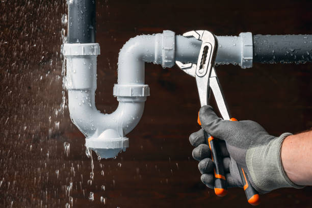 Professional Drain Cleaning technician working in Malcom, IA